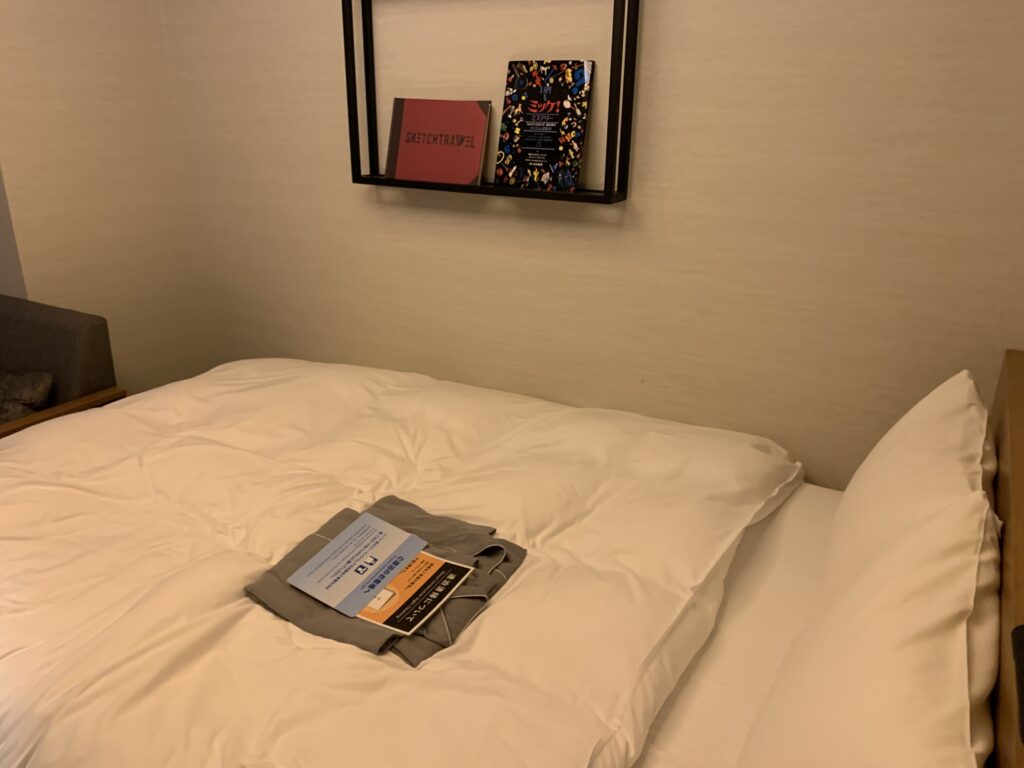 ランプライトブックスホテル　客室　ベッド